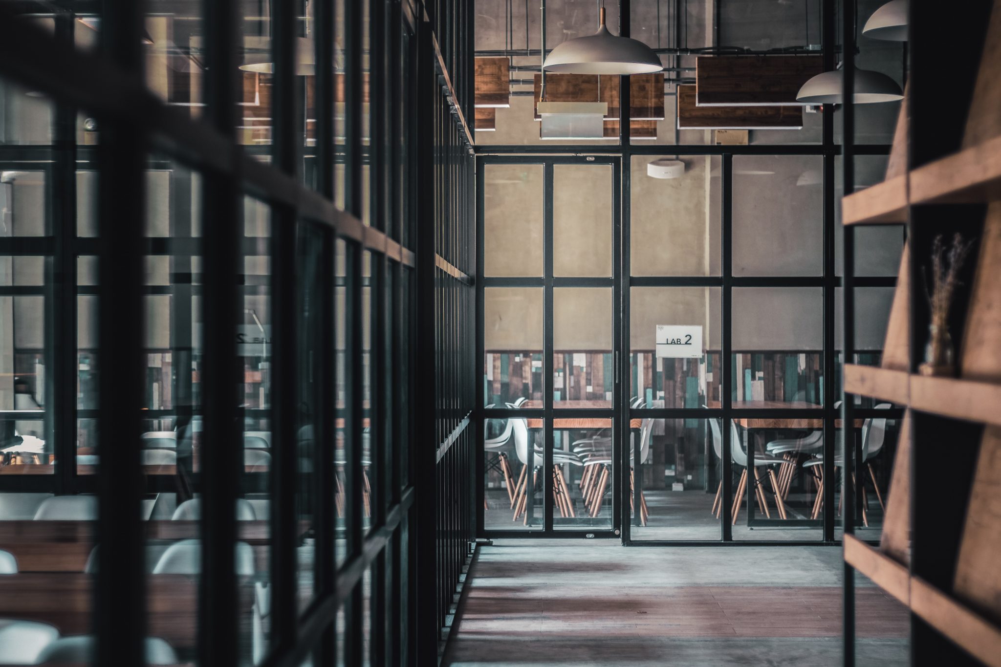 A picture of the inside of an office with a rustic design.